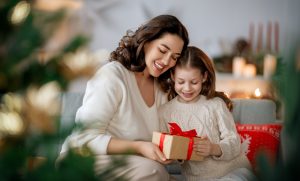 Merry,Christmas,And,Happy,Holidays.,Cheerful,Mom,And,Her,Cute
